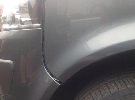 bashed bumper left wheel trim 5.JPG bashed bumper left wheel trim 5.JPG