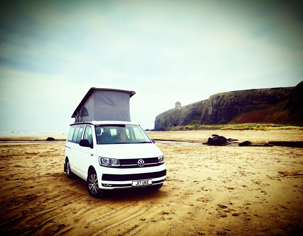 Our Cali Beach, on Downhill Beach - Northern Ireland. With Mussenden Temple in the background.